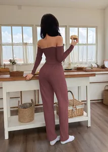 Back view of a chic women's ribbed off-the-shoulder loungewear set in stylish maroon