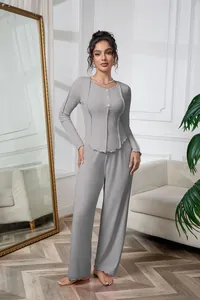 Full view of women's gray ribbed long-sleeved pajama set in home setting