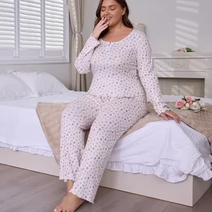 Cozy plus size floral pajama set with long sleeves and ruffled hems for women in white
