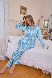 Women's blue and white striped pajama set with long sleeves and lapel collar.