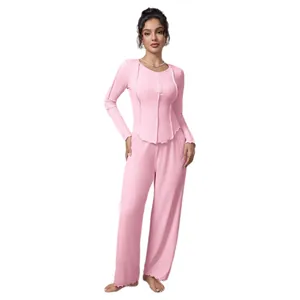 Women's pink ribbed long-sleeve loungewear set with wide-leg pants on white background