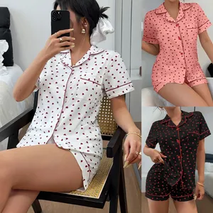 Stylish women's heart print pajama sets in white, pink, and black short sleeve styles