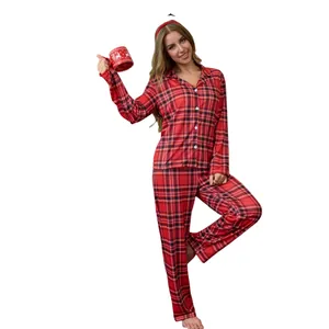 Red plaid Christmas pajama set with long sleeve button-up top and matching pants