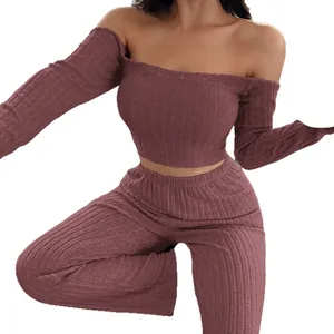 Women's two-piece ribbed loungewear set with off-shoulder crop top and trousers