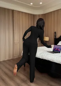 Cozy black ribbed knit lounge set for women featuring V-neck long sleeve top and pants