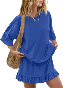 Detailed view of a casual blue two-piece set with a loose t-shirt and ruffled skirt.