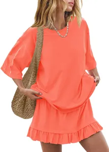 Detail view of casual coral short sleeve t-shirt and ruffled skirt two-piece set