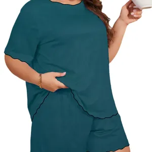Comfortable women's teal two-piece lounge set with cooling fabric and scalloped edges.