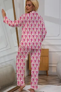 Detail showing pink monkey print on white women's long sleeve pajama set loungewear.