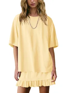 Two-piece casual summer set featuring oversized yellow T-shirt and ruffled mini skirt