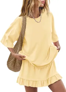 Women's casual yellow two-piece set with oversized t-shirt and ruffled mini skirt
