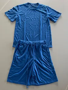 Detailed view of a blue men's summer athletic set featuring short sleeve shirt and shorts