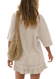 Back view of a stylish beige casual two-piece set with short sleeve T-shirt and ruffled skirt