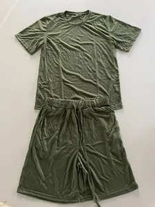 Detail view of a men's olive green casual two-piece summer shorts and t-shirt set.