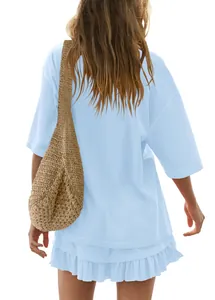 Back view of a light blue two-piece leisure set featuring a ruffled mini skirt