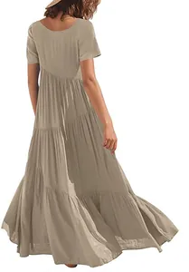 Back view of a khaki tiered loose beach maxi dress showing detailed fabric layers and flowy cut
