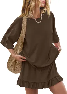 Detail showing the dark brown short sleeve t-shirt and ruffled mini skirt set texture.