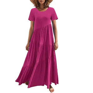 Magenta loose tiered maxi dress with short sleeves and asymmetric layered design.
