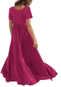 Back view of fuchsia pink tiered short sleeve loose maxi beach dress with ruffled hem