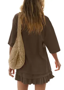 Back view of chocolate brown oversized t-shirt and ruffled mini skirt set for summer