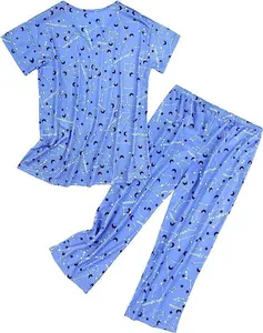 Άνετο μπλε σετ πιτζάμας δύο τεμαχίων με μαγικά σχέδια αστερισμών και φεγγαριών
