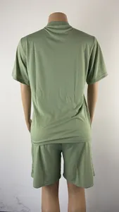Back view of men's green summer casual sports set with t-shirt and shorts