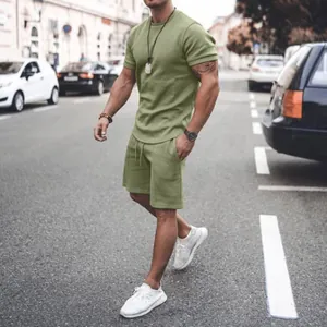 Men's stylish sage green summer casual streetwear set featuring t-shirt and shorts