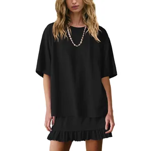 Women's black two-piece lounge set with oversized T-shirt and ruffled mini skirt