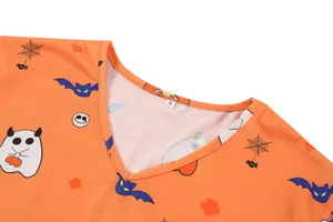 Λεπτομέρεια λαιμόκοψης V με σχέδια Halloween σε πορτοκαλί τοπ πιτζάμας για γυναίκες