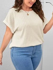 Close-up detail of plus size off-white short sleeve t-shirt with ribbed knit texture