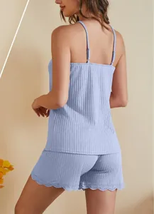Detailed back view of a light blue ribbed camisole and shorts pajama set with lace trim