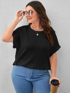 Detailed view of women's black ribbed short-sleeved T-shirt in a plus-size fit