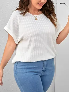 Macro view of plus size white short sleeve T-shirt showing its soft ribbed texture