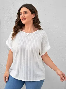 Close-up detail of plus size white short sleeve T-shirt with vertical ribbed texture
