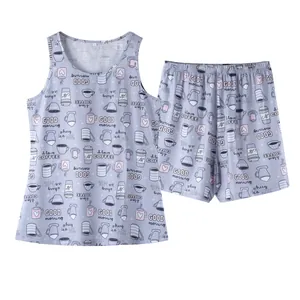 Close-up of women's lavender pajama set featuring tank top and shorts with coffee print