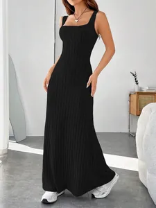Detailed view of a slim-fit black ribbed maxi tank dress with elegant wide straps