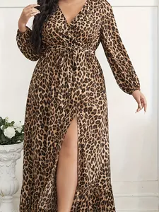 Elegant leopard print long sleeve maxi dress with high slit and waist tie for women.