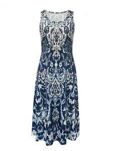 Detailed front view of sleeveless midi dress featuring blue and white paisley prints