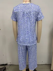 Detailed back view of a blue and white printed two-piece pajama set on a mannequin