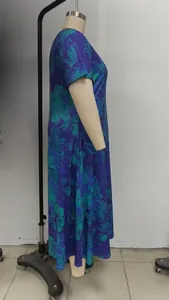 Detailed side view of plus size V-neck summer floral print dress shown on mannequin