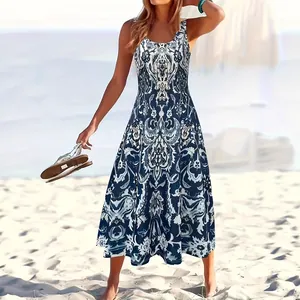 Elegant summer sleeveless maxi dress with vintage blue floral print on sunny beach scene