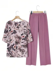 Women's plus size leisure set with tropical floral print top and solid mauve wide-leg pants