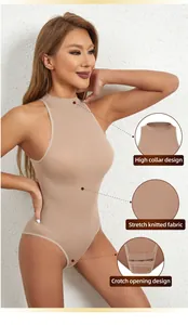 Detail view of beige sleeveless bodysuit showing high collar and ribbed stretch fabric.