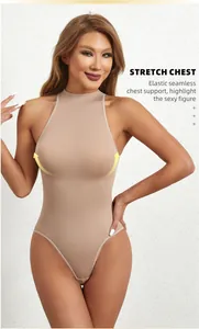 Close-up of a sleeveless ribbed beige bodysuit with high neck and tummy control feature.