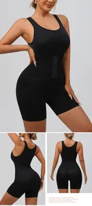 Macro view of black tummy control bodysuit with front hook-and-eye closure design.