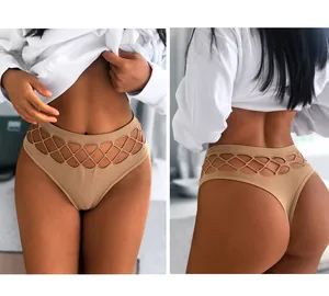 Detail view of seamless nude thong featuring a fishnet hollow-out waistband design