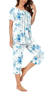 Two-piece floral print pajama set with short-sleeve button top and cropped pants