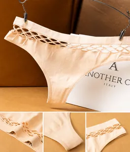 Detailed view of seamless nude T-back thong featuring breathable hollow-out mesh design