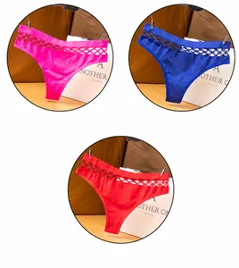 Showcase of seamless hollow-out fishnet sports thongs in plum, blue, and red colors.