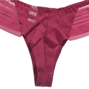 Detail view of sexy striped mesh thong for women in burgundy with low waist design
